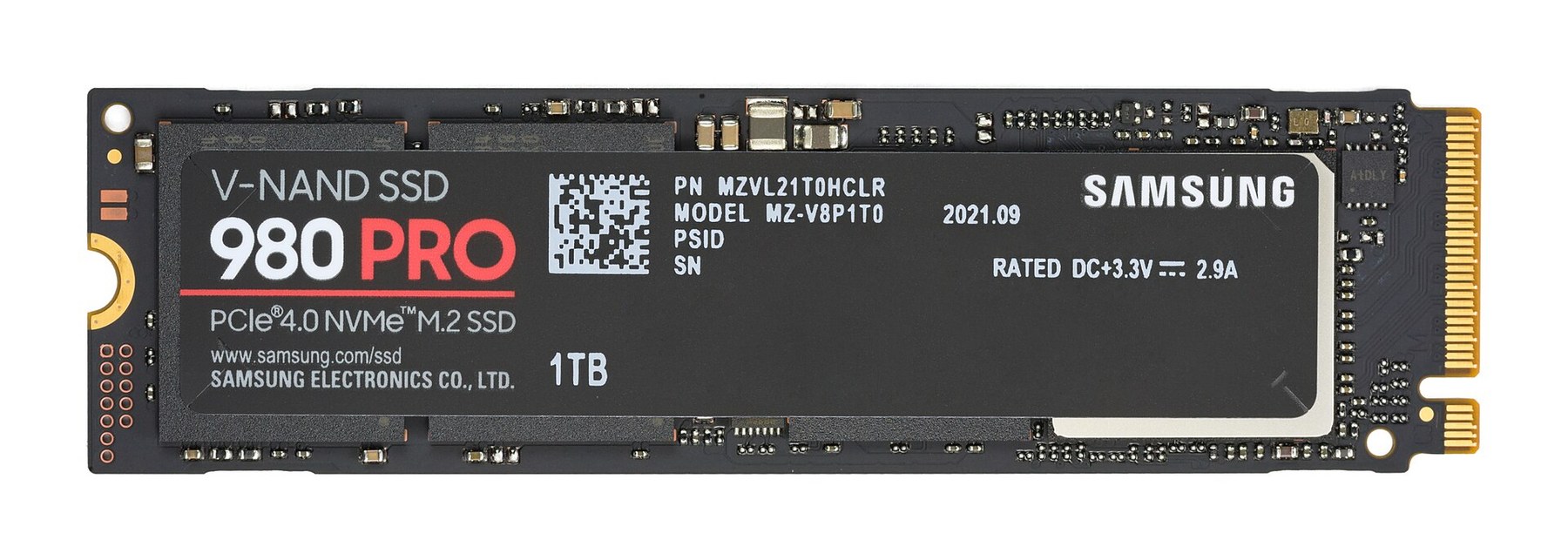 A Samsung 980 PRO solid-state drive, a long thin circuit board with a black label reading PCIe 4.0 NVMe M.2 SSD and gold contacts at the right-hand end
