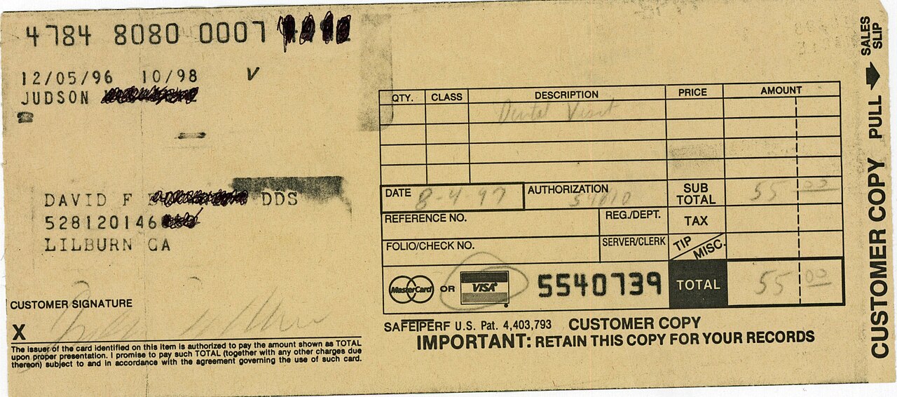 A carbon card slip from 1997 with an imprinted card number, a handwritten total of 55.00 and a handwritten authorization number