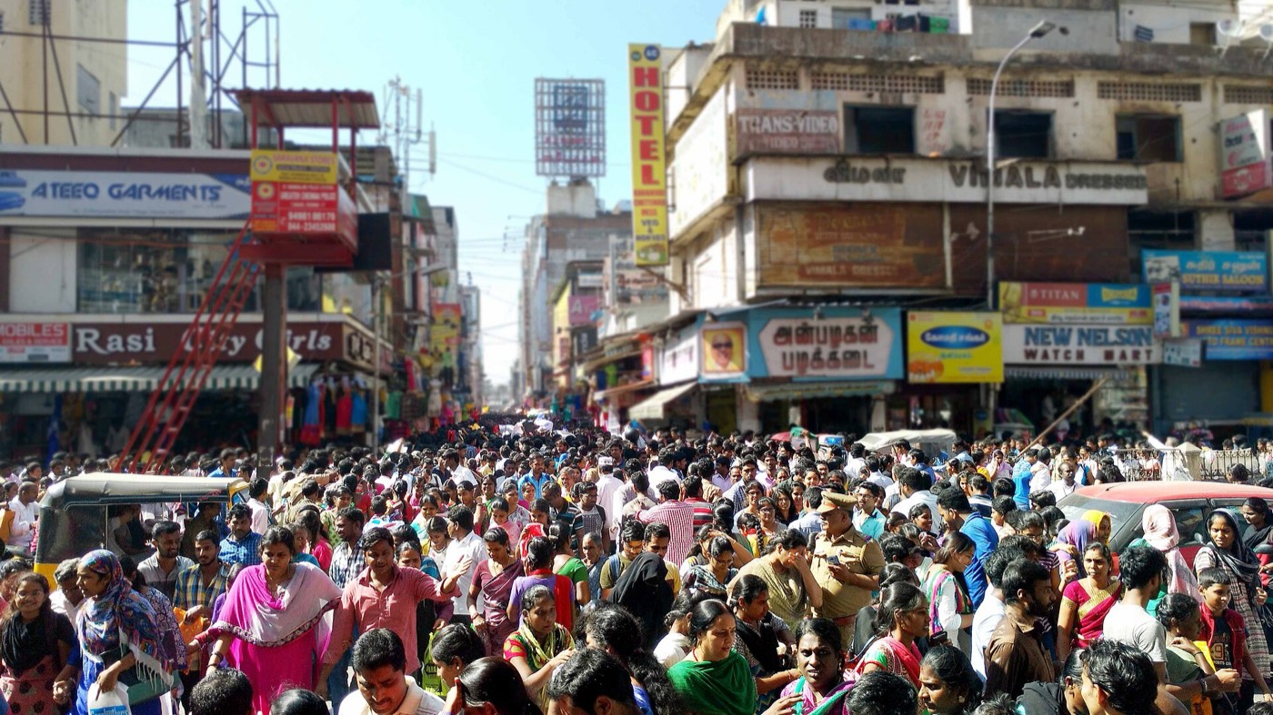 A street in T. Nagar, Chennai, packed from side to side with shoppers under shop signs